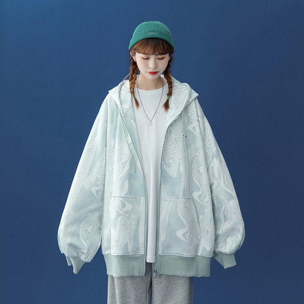 Široka ženska majica s patentnim zatvaračem