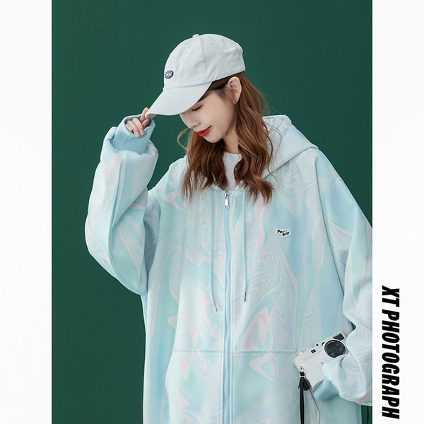 Široka ženska majica s patentnim zatvaračem