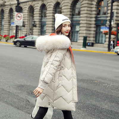 Γυναικείο μακρύ χειμερινό  μπουφάν με κουκούλα