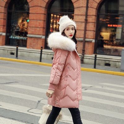 Γυναικείο μακρύ χειμερινό  μπουφάν με κουκούλα