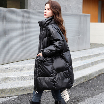 Γυναικείο φαρδύ μπουφάν με ψηλό γιακά και βαθιές τσέπες