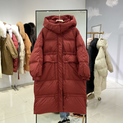 Γυναικείο μακρύ μπουφάν με κουκούλα και τσέπες