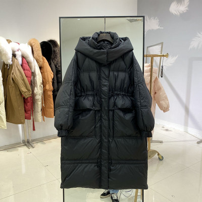 Γυναικείο μακρύ μπουφάν με κουκούλα και τσέπες