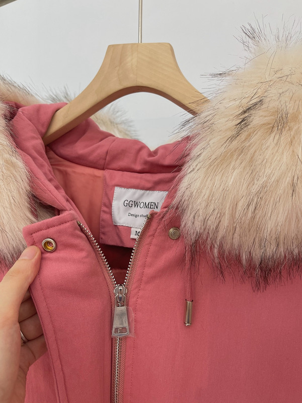 Elegantna duga ženska jakna s kapuljačom i džepovima