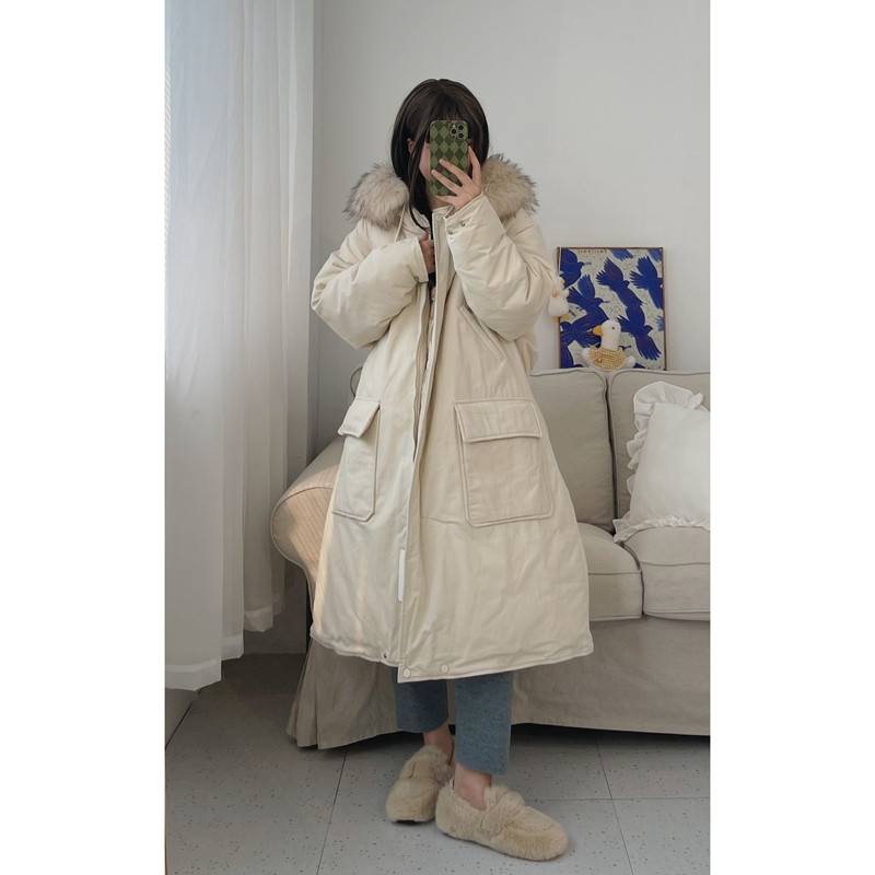 Elegantna duga ženska jakna s kapuljačom i džepovima