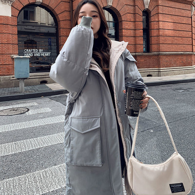 Μακρύ γυναικείο χειμερινό μπουφάν με τσέπες