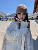 Πολύ φαρδύ μοντέλο γυναικείο μπουφάν για το χειμώνα με μεγάλες τσέπες