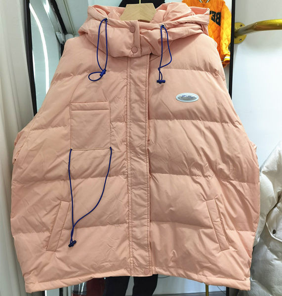 Γυναικείο μπουφάν φαρδύ μοντέλο με κουκούλα κατάλληλο για φθινόπωρο και χειμώνα