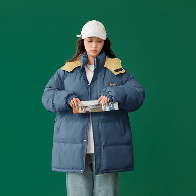 Γυναικείο χειμερινό μπουφάν με κουμπιά και μοντέλο σε φερμουάρ