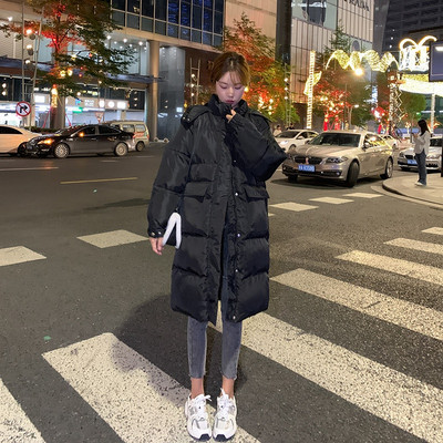 Ženska duga jakna s džepovima na kapuljači, patentnim zatvaračem i gumbima