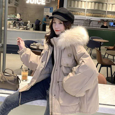 Χειμερινό μπουφάν φαρδύ μοντέλο με τσέπες και eco γούνα στην κουκούλα