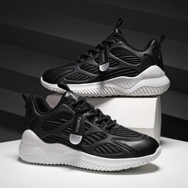 Σύγχρονα γυναικεία αθλητικά παπούτσια από οικολογικό δέρμα με επίπεδη σόλα και πλέγμα