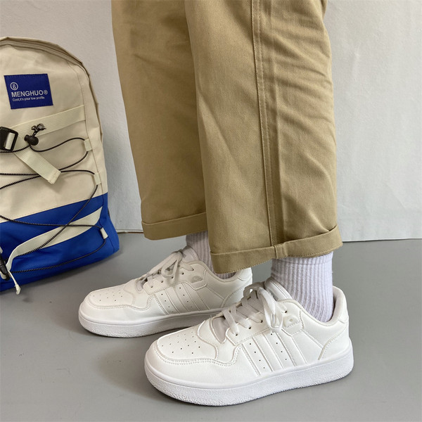 Ženske tekstilne tenisice i ravni đon