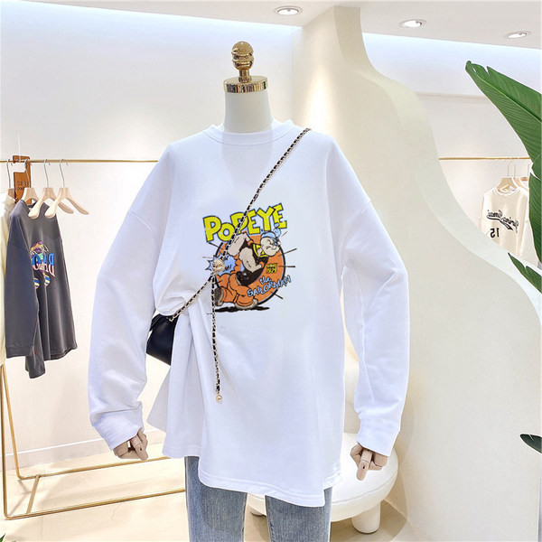 Bluză lată din bumbac cu imprimeu color și decolteu oval