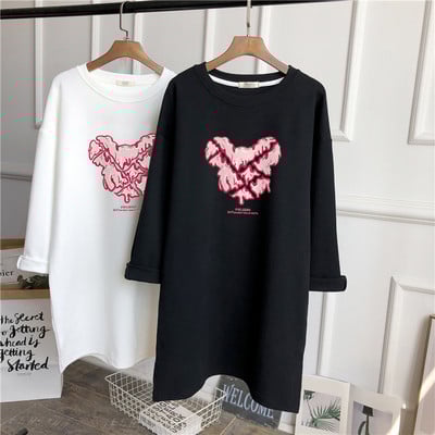 Široka jesensko-zimska bluza s aplikacijom u boji