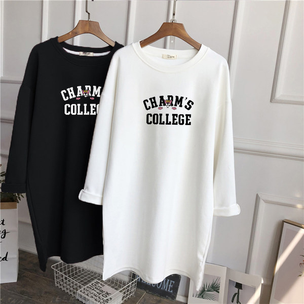 Široka jesensko-zimska bluza s aplikacijom u boji