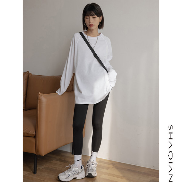 Bluză de damă lată cu mâneci lungi în culoarea albă