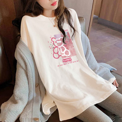 Široka ženska bluza sa raznim aplikacijama