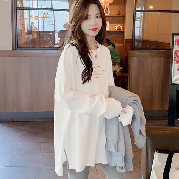 Široka ženska bluza sa raznim aplikacijama