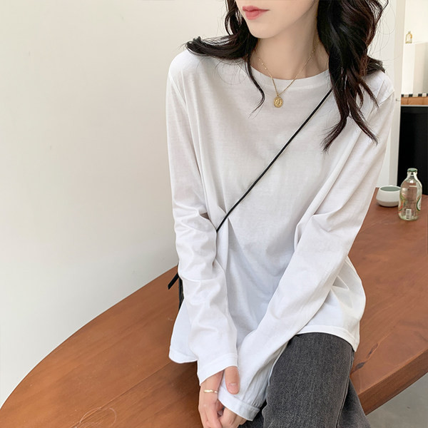 Γυναικεία φαρδιά μπλούζα σε λευκό και μαύρο