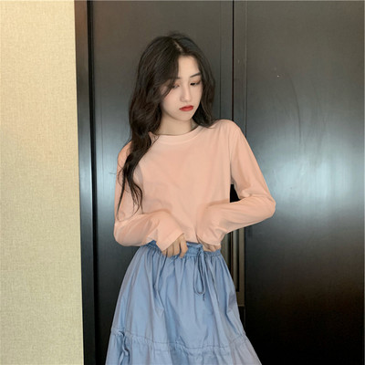 Široka ležerna bluza s okruglim izrezom u više boja