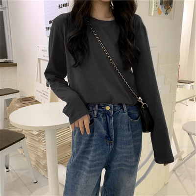 Široka ležerna bluza s okruglim izrezom u više boja