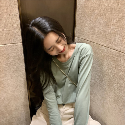 Široka ležerna bluza s okruglim izrezom u više boja