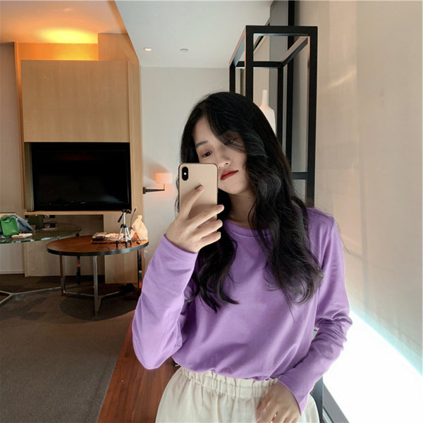 Široka ležerna bluza s okruglim izrezom u više boja