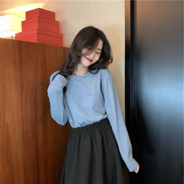 Široka ležerna bluza s okruglim izrezom u više boja