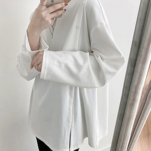 Široka asimetrična bluza s gumbima i prorezom