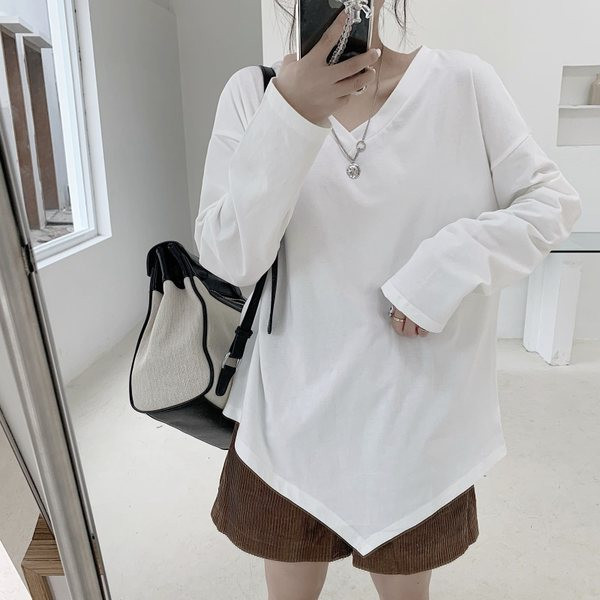 Γυναικεία ασύμμετρη μπλούζα με μακριά μανίκια