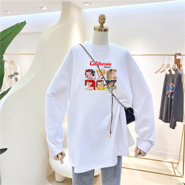 Široka jesensko-zimska bluza s ovalnim izrezom i printom u boji