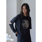 Ležerna ženska bluza s izrezima u crnoj boji