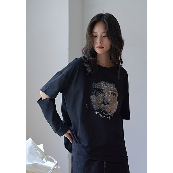 Ležerna ženska bluza s izrezima u crnoj boji