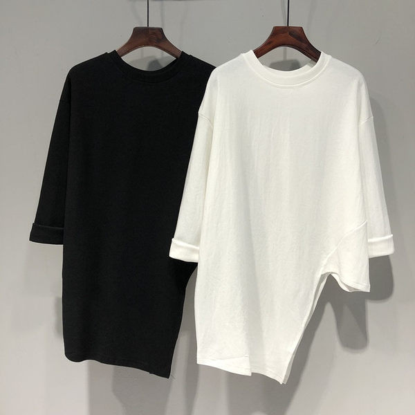 Široka asimetrična bluza s 3/4 rukavima