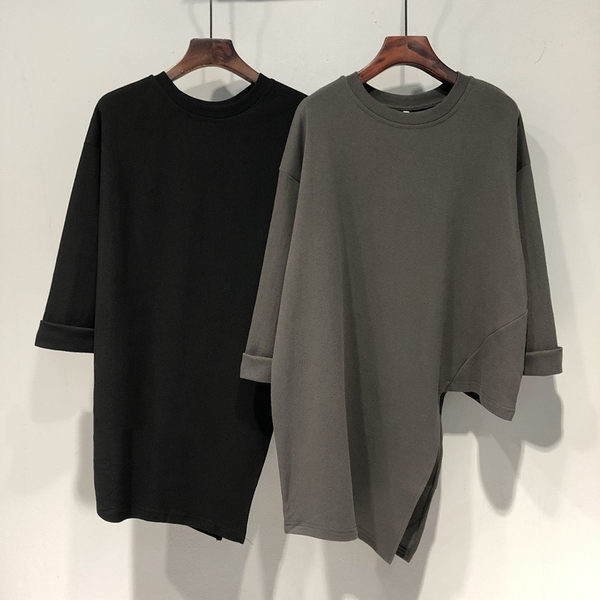 Široka asimetrična bluza s 3/4 rukavima