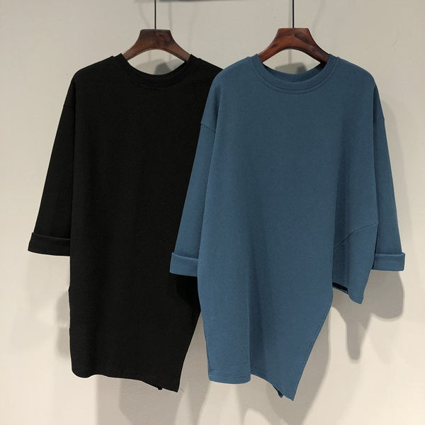 Široka asimetrična bluza s 3/4 rukavima