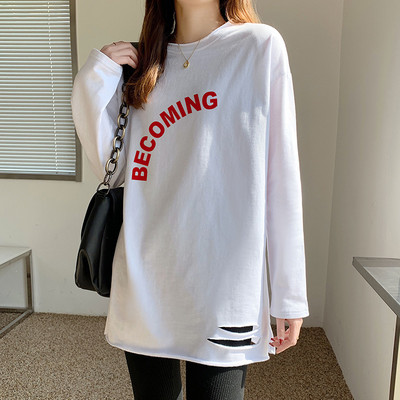 Ženska široka bluza s poderanim efektom