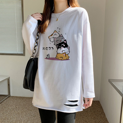 Ženska široka bluza s poderanim efektom