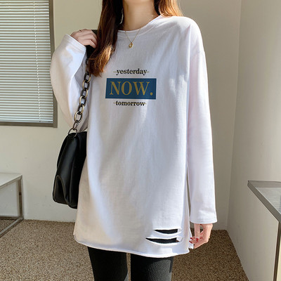 Ženska široka bluza s poderanim efektom