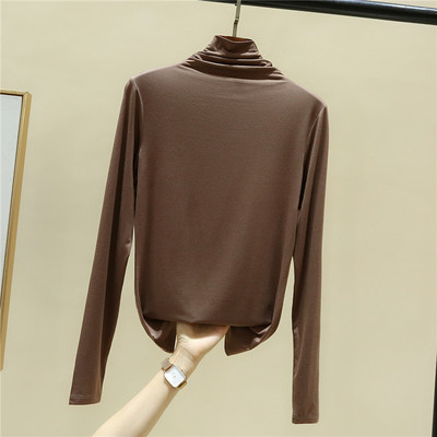 Moderna ženska bluza pripijenog modela s polo kragnom