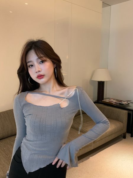 Asimetrična ženska bluza na veze