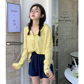 Novi model ženske jednobojne bluze s kapuljačom i gumbima