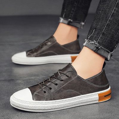 Muške kožne tenisice s ravnim potplatom i vezicama