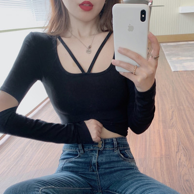 Ženski crop top dugih rukava i izrezanih dijelova