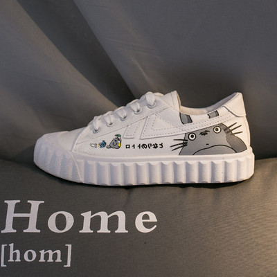 Ženske casual tenisice s aplikacijom u bijeloj i crnoj boji