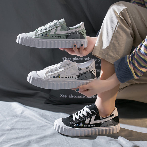 Ženske casual tenisice s aplikacijom u bijeloj i crnoj boji