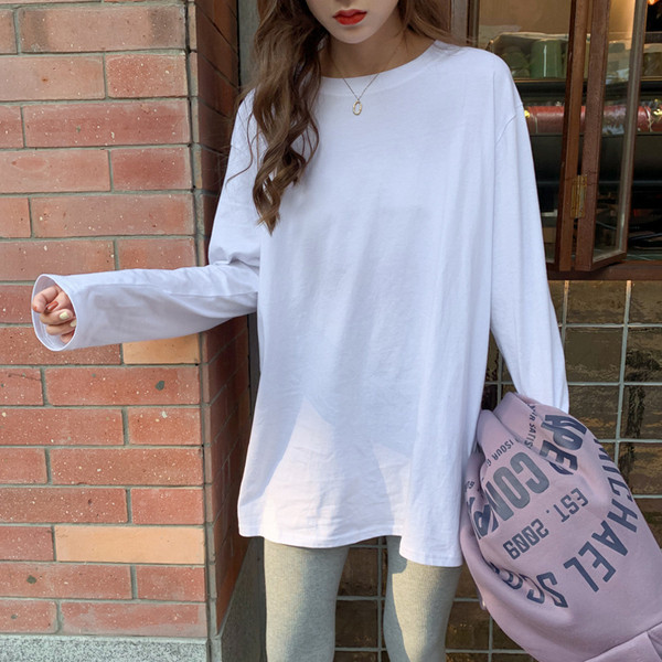 Jednobojna ženska bluza dugih rukava - široki model