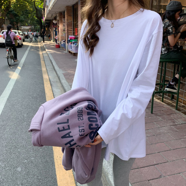 Jednobojna ženska bluza dugih rukava - široki model