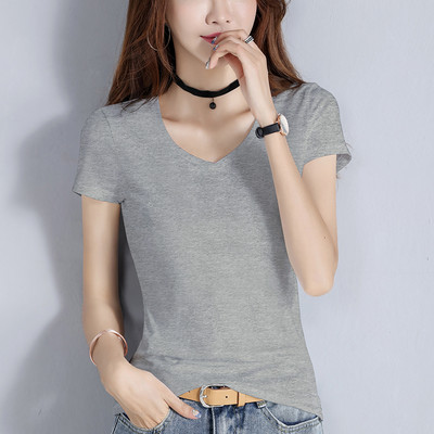 Bluză din bumbac de culoare uni cu decolteu spitz sau oval